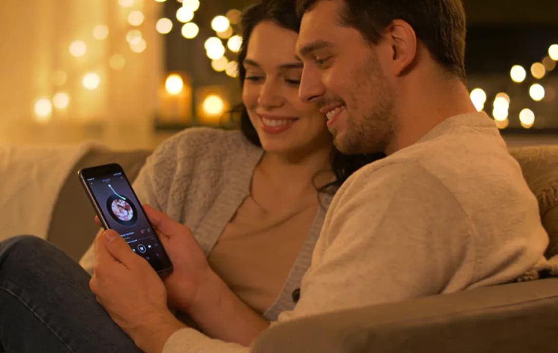 Couple listening to a personalized romantic track created with an AI love song generator